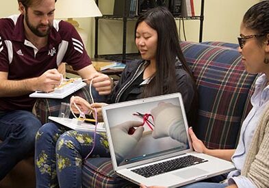 Students on couch watching video on knot-tying